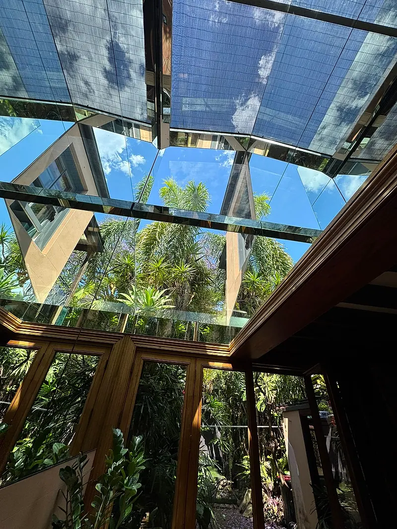Glass roof and conservatory seen from inside